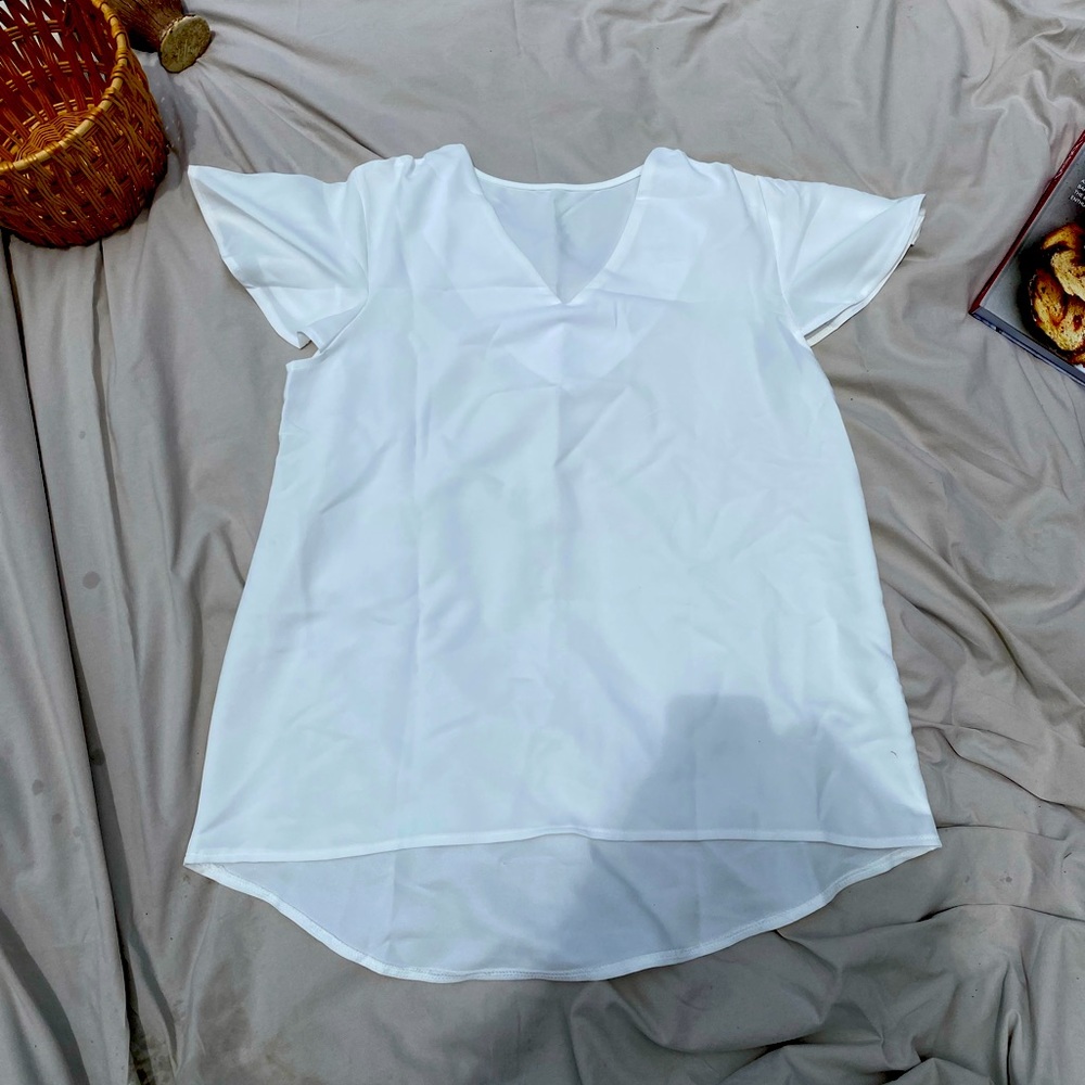 New! Soft, white blouse. Short sleeve, V neck great for work!